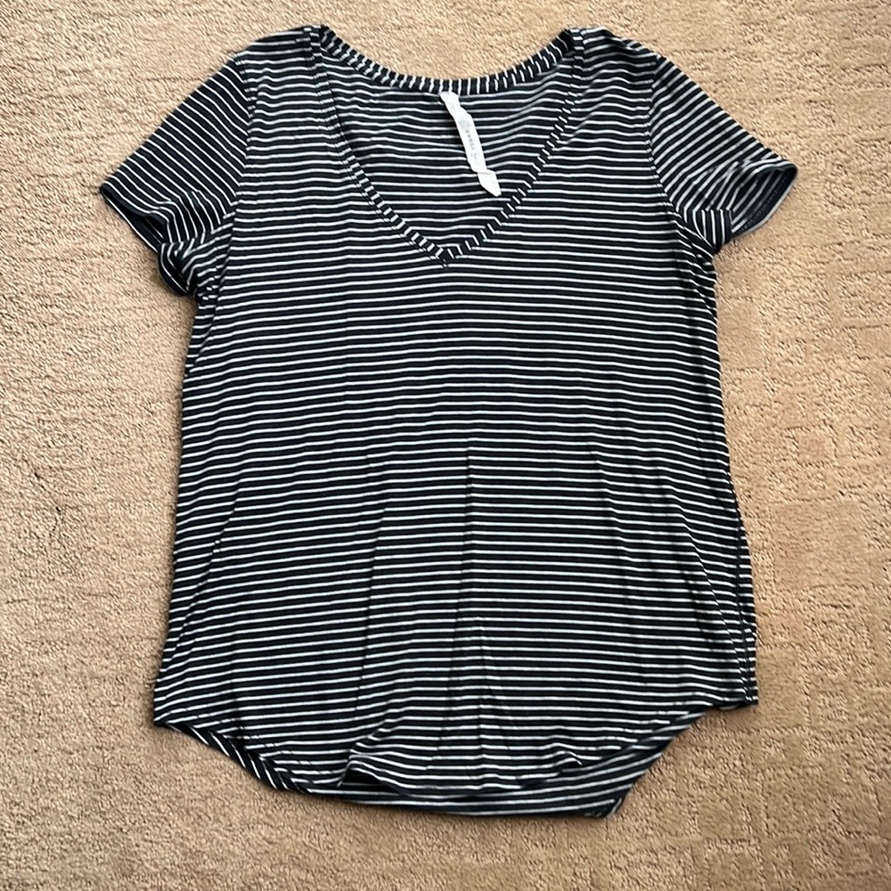 Gray and white striped Lululemon casual v-neck shirt in size 10